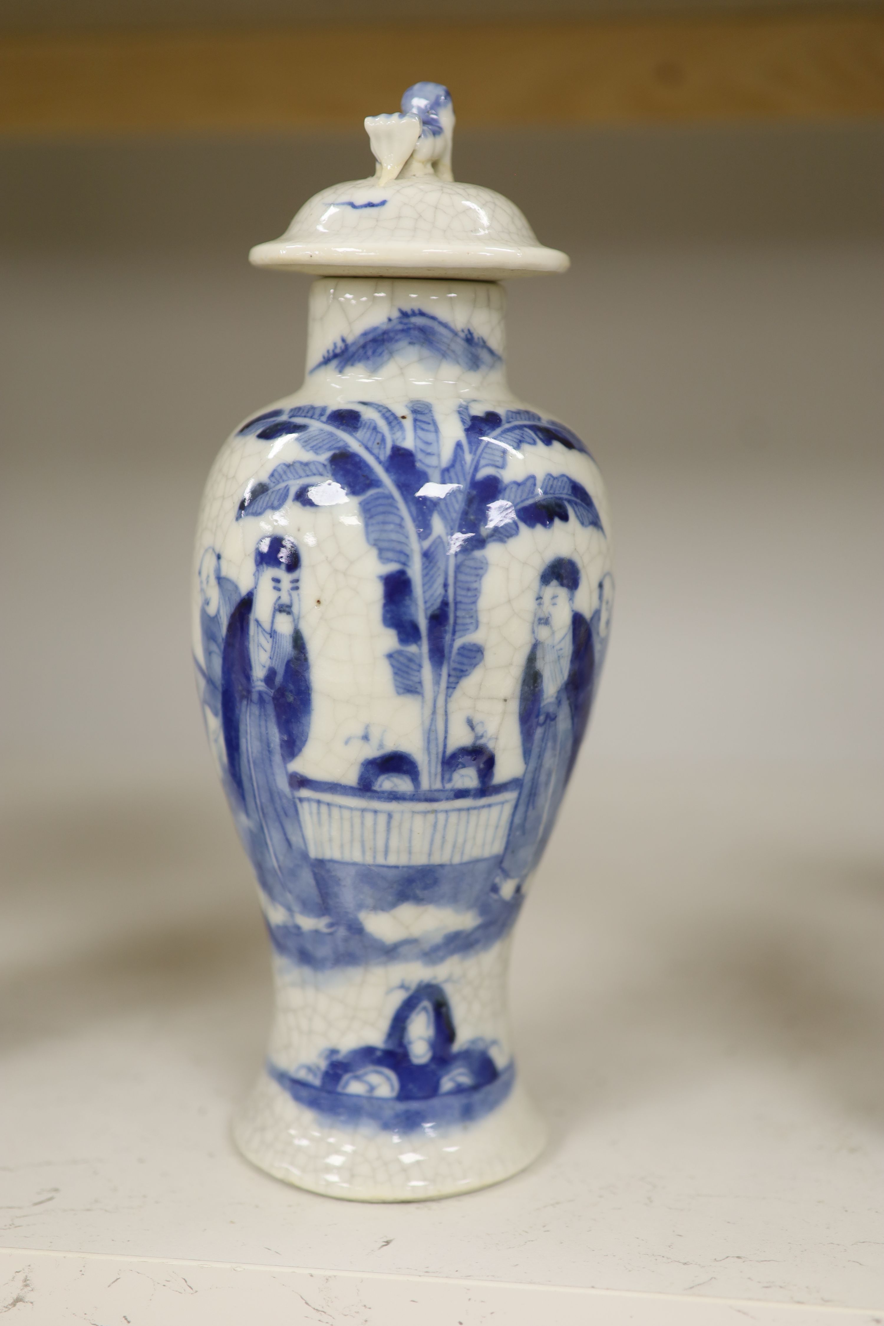 A late 19th century Chinese blue and white crackle glaze vase and cover, height 27cm